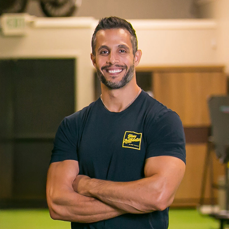 Picture of Sal Di Stefano standing in a gym